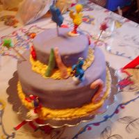 My Cousin's Birthday (Side 2) This cake was made for my cousin's second birthday. The crayons and the number 2 were made with candy clay elmo was made out of...