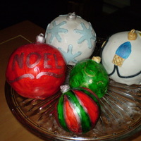Christmas Ornaments Bake and fill pans used for small balls. Covered in fondant,