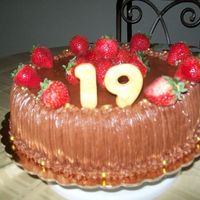 100_0440.jpg vanilla cake, chocolate buttercream and strawberries.