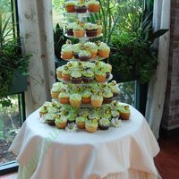 Cupcake Wedding Tower Cupcakes wedding - BC icing on vanilla and chocolate cupcakes - bumble bees and daisies made of gumpaste. Bride was a garden lover - thus...