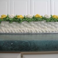 50Th Wedding Anniversary Cake - Side View Just a side view of cake. It looked really short from the other view and all leaves. It didn't have much basketweave showing in the...
