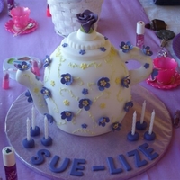 Tea Pot With Purple Flower White fonadant covered Tea Pot cake with purple flowers