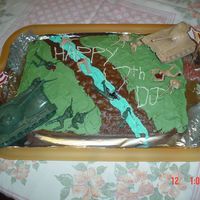 Battle Field As a joke for my brother who loved army soldiers when he was little i created this with butter icingon a choc sponge and used figurines on...