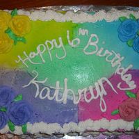 Rainbow Roses This is the cake for my daughter this year! She wanted a rainbow; so I did rainbow colors with corresponding roses. My first time using...