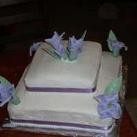 Two-Tier Square Cake Purple Flowers This was a cake I did as a favor for a friend of a friend; I had a week to decide what to do; and I wasn't given any direction other...