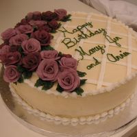 Office B-Day Cake Plain old white cake and buttercream. I think if I didn't do the two different shades of roses it wouldn't have looked as nice....