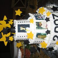 Brit's Grad Cake This was only my second cake ever. It was for my sister, I did the same cake a week before a little bigger only in different colors for a...