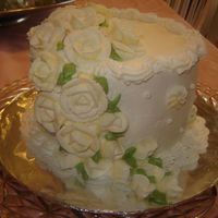 6" Cake With Roses All buttercream, frosting and roses. This cake was done for Easter.
