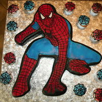 Spider Man.. This was a challenge.. But I think it turned out great!! A lot of hand piping and airbrushing ... also the cupcakes had webs too..