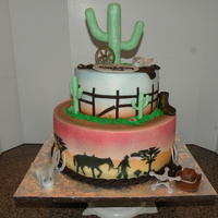 Cowboy I made this for a man who is realy into cowboys.. he loved it.. The cake turned out great with the stenciling and airbrushing.. I loved...