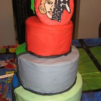 Star Wars This is the other side of the Power Ranger cake for my nephews. Again its a 3 tiered chocolate cake with buttercream icing. Black fondant...