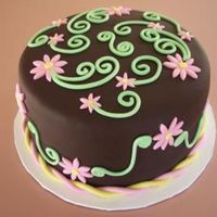 Chocolate, Chocolate And More Chocolate Chocolate cake, crumb coated with chocolate icing, filled with chocolate mousse and covered with Chocolate Satin Ice fondant. Decorations...