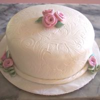 Test Cake I had extra batter from a sheet cake I'm doing so I decided it was a good time to try out my new toy for embossing fondant and see how...