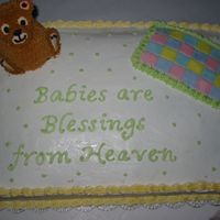 Randoms_057.jpg This was my second cake. The sheet cake is white cake with cannoli filling and the bear is chocolate cake. Although I could pick out a...