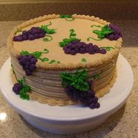 Vineyard I made this cake as a practice for an upcoming vineyard themed engagement party. My first attempt with an icing come and piped grapes.