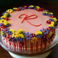 Celebration Cake With Stripes And Flowers This cake was for a post-wedding reception celebration -- just a small gathering. It is a freckled mocha cake with Bailey's mousse...