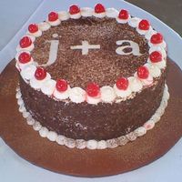 Black Forest Groom's Cake This was the groom's cake that was made to go with the wedding cake. I cut letters out to match the font of the wedding cake topper...