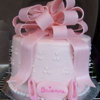 Pink Ballet Cake Gumpaste Bow, fondant ballet slippers. Assembled the cake, bow and slippers at the dance! Buttercream frosting. Posted this cake a few days...