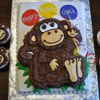 Monkey Cake wsca with buttercream dream frosting and fondant balloons.