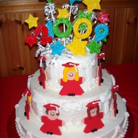 Jeff's Graduation Made this for our good friends son's graduation. Saw it in a Wilton yearbook and had to try it. Buttercream and fondant accents.