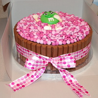 Candy Barrel Hershey's special dark chocolate cake and frosting. Marshmallow fondant M&M. Didn't turn out as well as I would have liked...