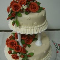 Tiered Cake final cake at wilton course 3, fondant mixed with gumpaste roses!