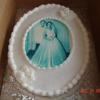 50Th Anniversary I took their wedding picture to king soopers, and they made it edible for me. White cake with rasberry filling, all butter cream.