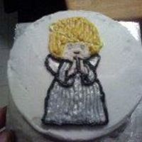 Angel I made this cake for my friend's mother who turned 80, she really loves angels. It's just a 4" round cake and I hand...