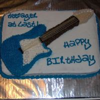 Guitar The made the guitar on the cake to look just like the boys guitar that I made this for.