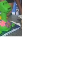 Dinosaur Birthday cake I did for my sister. I used brownies for the neck instead of RKT. Worked out great for me.