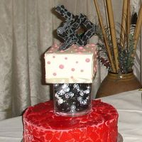 30 This cake was for a friend's birthday. The bottom tier was carrot cake, the top tier was coconut walnut. I frosted the carrot cake in...