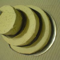 Glbt Cake This cake was a donation. There was no topper but it has really pretty toule wrapped down the cake. Simple but elegant.