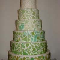 Mosaic Cake The cake decoration on this is poured sugar. Acquiring the gradient was not easy, but it was alot of fun!