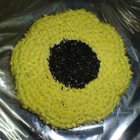 Sunflower Cake Eggless chocolate cake with buttercream icing. chocolate sugar strands at the centre. every1 loved it, especially knowing that its eggless...