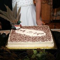 Aryen_And_Doug_Wedding_381.jpg This is a groom's cake that I made for my cousin. He had a hunting theme to his side of the room.