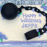Jeffs_Cake.jpg WASC with raspberrsy filling and vanilla SMB. Ball is RK's covered with fondant. Shackle is gumpaste. Fondant Flowers. The BC was...