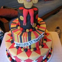 Spirit Week This cake was made for a middle school's spirit week. The bull mascot was sculpted from fondant.