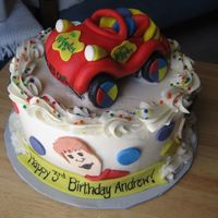 The Wiggles Big Red Car made out of MMF. Frosted in buttercream with fondant faces of all the wiggles guys. I used a edible markers to draw their...