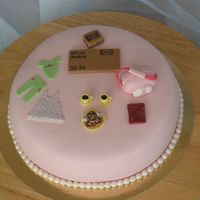 Anna 30 This cake I made for a friend. She loves IKEA, shopping children's clothes, traveling and just take a coffee with her friends. She...