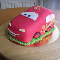 Lightning Mcqueen Vanilla sponge cake filled with caramel mousse and banana whipped cream. Covered in and decorated in sugar paste. I didn't have time...
