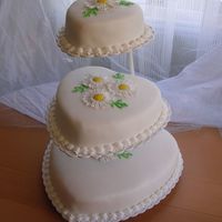 My First Wedding Cake A simple cake for a simple wedding. Fondant (sugar paste) covered cake. Ox-eye daisy's made in gum paste. Aug -07