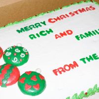 Christmas Yellow cake with pineapple/bavarian cream filling frosted with whipped cream buttercream frosting. Fondant covering the "ornaments&...