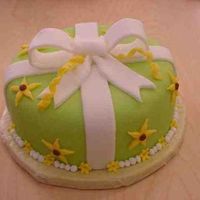 Gift Cake This is my first try at Fondant. I put my own twist to the cake the was suggested in the class. It turned out pretty well for my first...