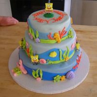 Spongebob Underwater Cake I did this cake for my daughters 2nd birthday. It's covered in MMF. The fishes and shells we made using a sculpey mold. The jellyfish...