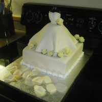 Dress Fondant covered, on a sheetcake.