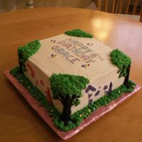 Painted Pony 10" square iced in BC with piped trees on each corner. Different colored pony on each side made of fondant. Fondant marbled lettering...