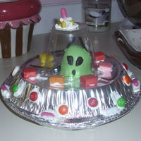 Alien Cupcakes My son made these Alien cupcakes from the book "Hello Cupcakes". The book showed a small saucer, but we opted for the bigger pie...