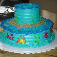 Fishy Birthday Cake What a fun cake to make! This was a cake I made for my boyfriend's birthday. It was banana cake with banana pudding and sliced bananas...