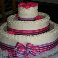 Pink And Purple Baby Shower Cake My co-worker asked me to make her a pink and purple baby shower cake (she's having her first baby girl!) so I put this cake together;...