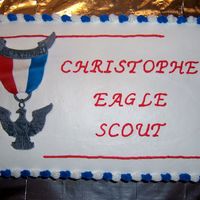 Eagle Scout lemon cake with lemon buttercream. Eagle scout medallion made out ofof gumpaste by my DH.